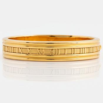 1081. A Tiffany bangle "Atlas" in 18K gold.