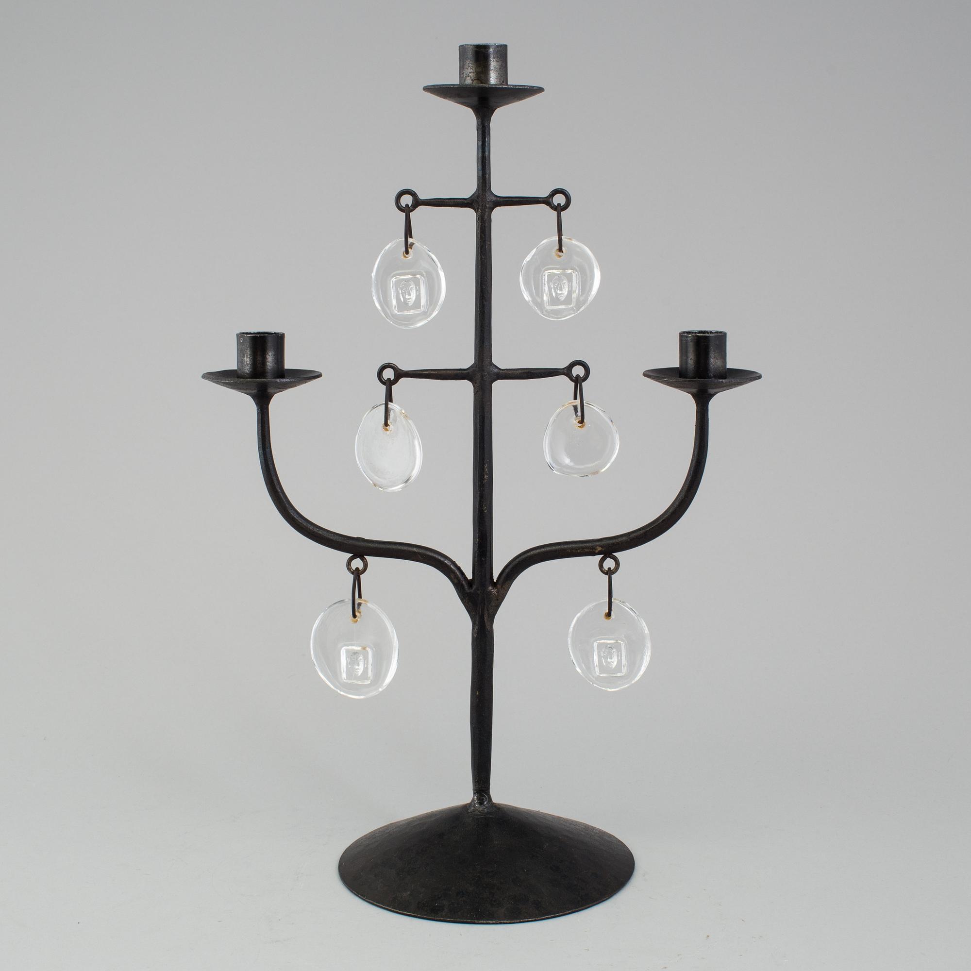 A wrought iron and glass candelabra by Erik Höglund.