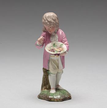 A Höchst porcelain figure of a boy, 1770's.