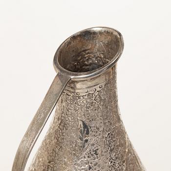 A pair of jugs, silver, Pakistan, mid-20th century.