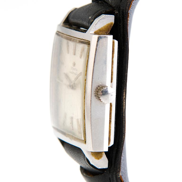 A steel Zenith wristwatch from 1960:s. 33x35mm.