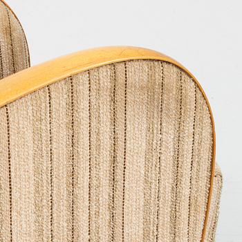 A pair of Swedish Modern easy chairs, Dux T-serie, 1940's/50's.
