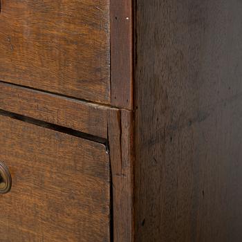 A mahogany and mahogany veneer desk with desk chair, 20th Century.