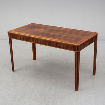 A desk by Carl Malmsten, dated 1979.