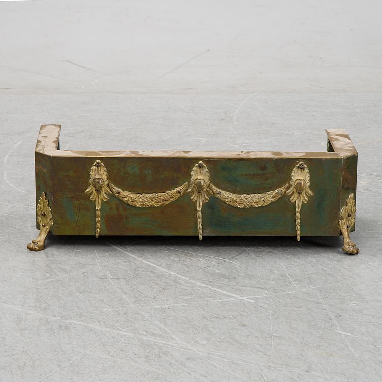 Spark protection and fire tools in brass, first half of the 20th century.