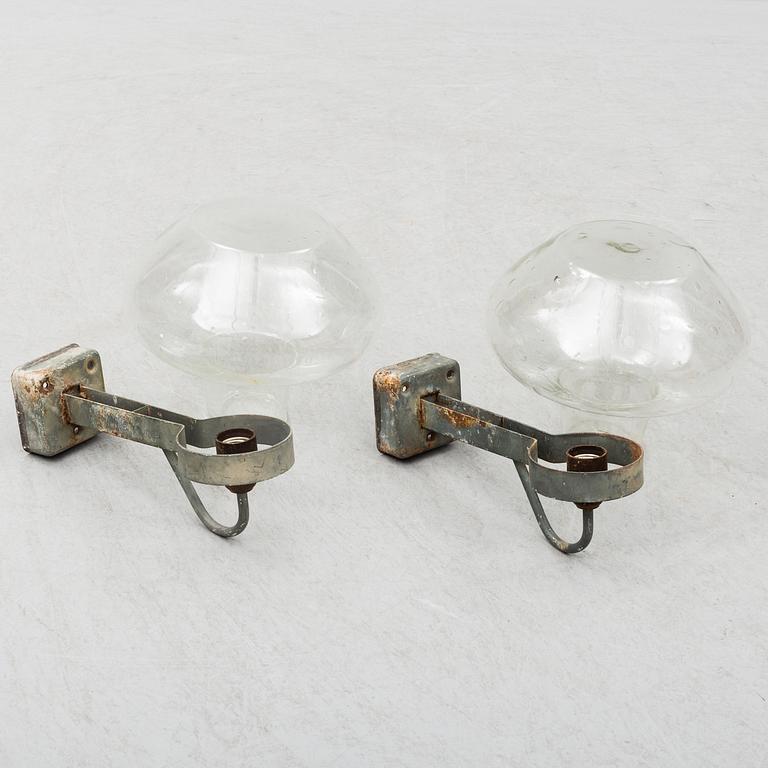 A pair of wall lamps by Asea Skandia.