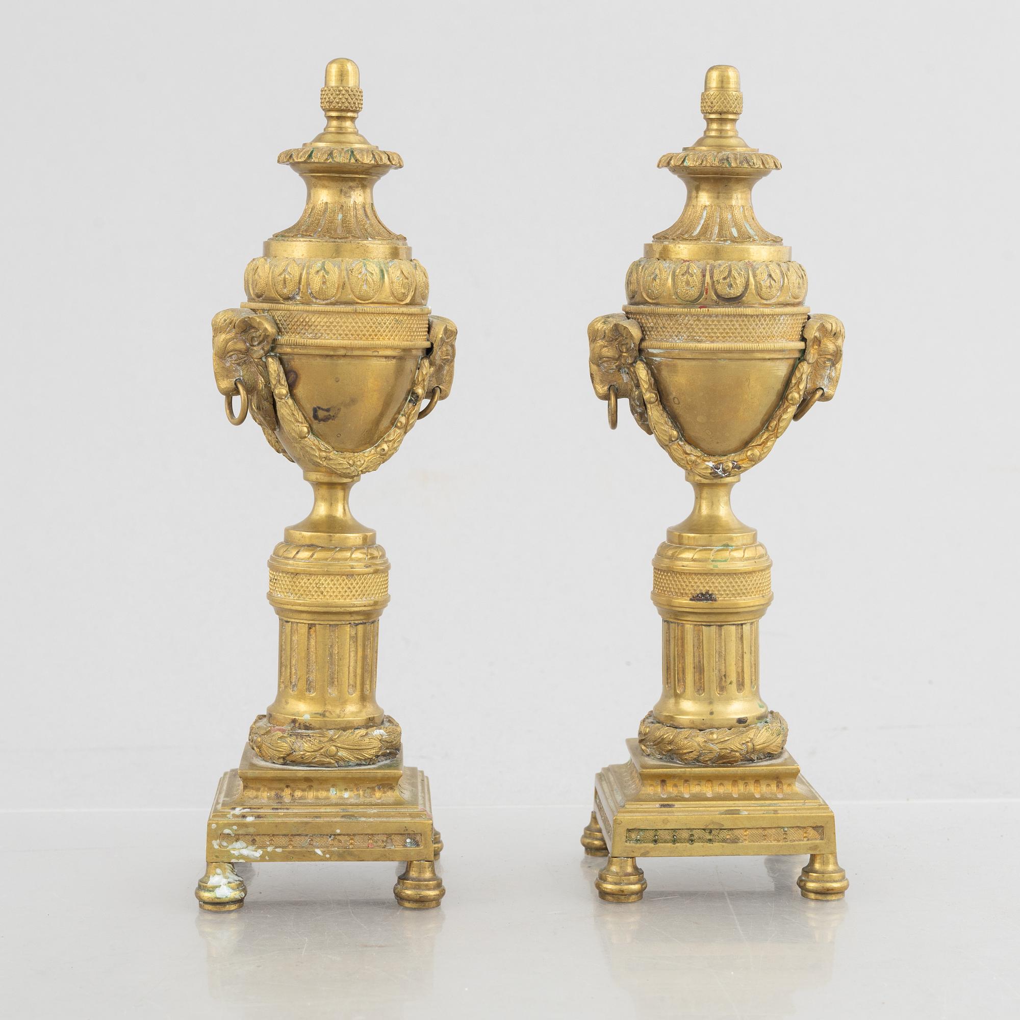 A pair of Louis XVI-style candlesticks, late 19th century.