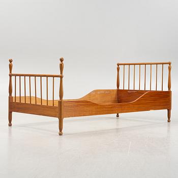 Josef Frank, a model B 860 bedframe, Firma Svenskt Tenn, mid 20th century.