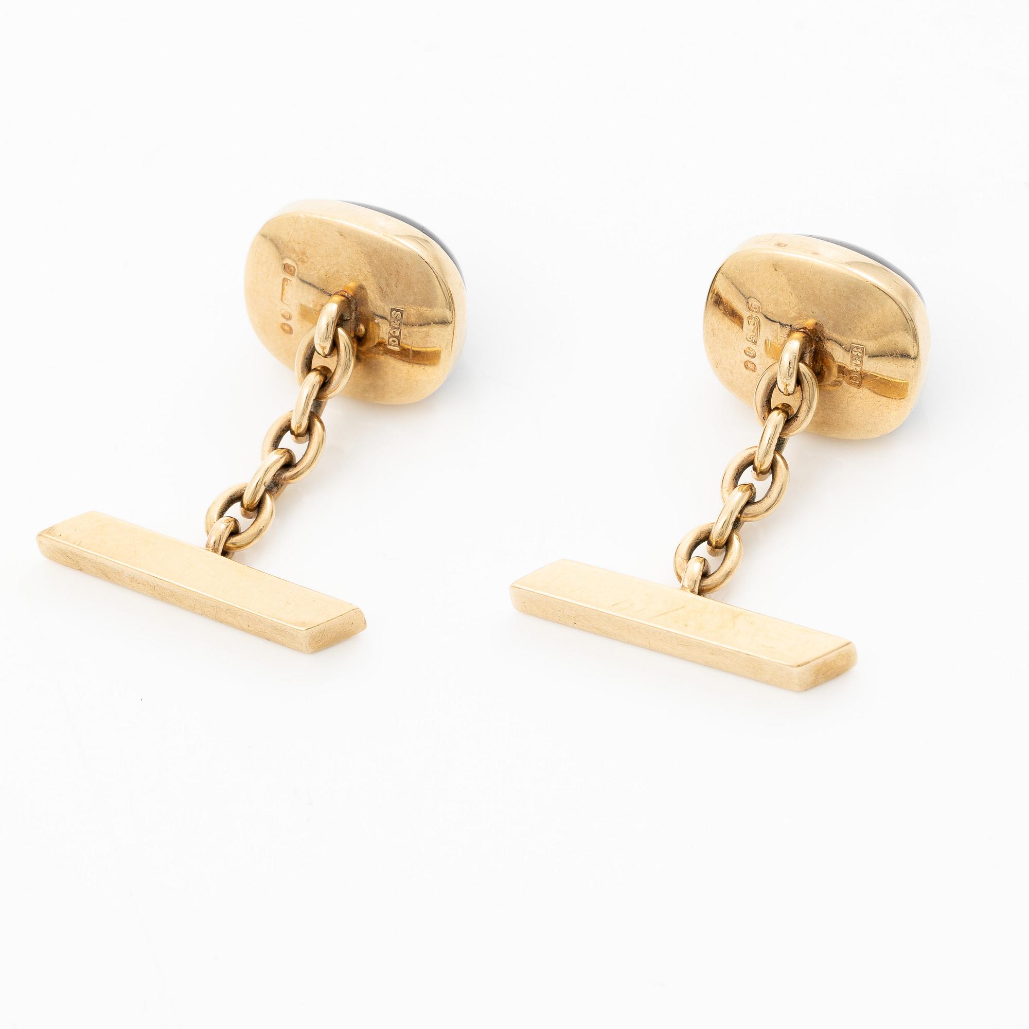 Cufflinks, 9K gold with cabochon-cut amethysts, case marked "R.W. Yeo Ltd, Jewellers, 6, Burlington Arcade, W.1.