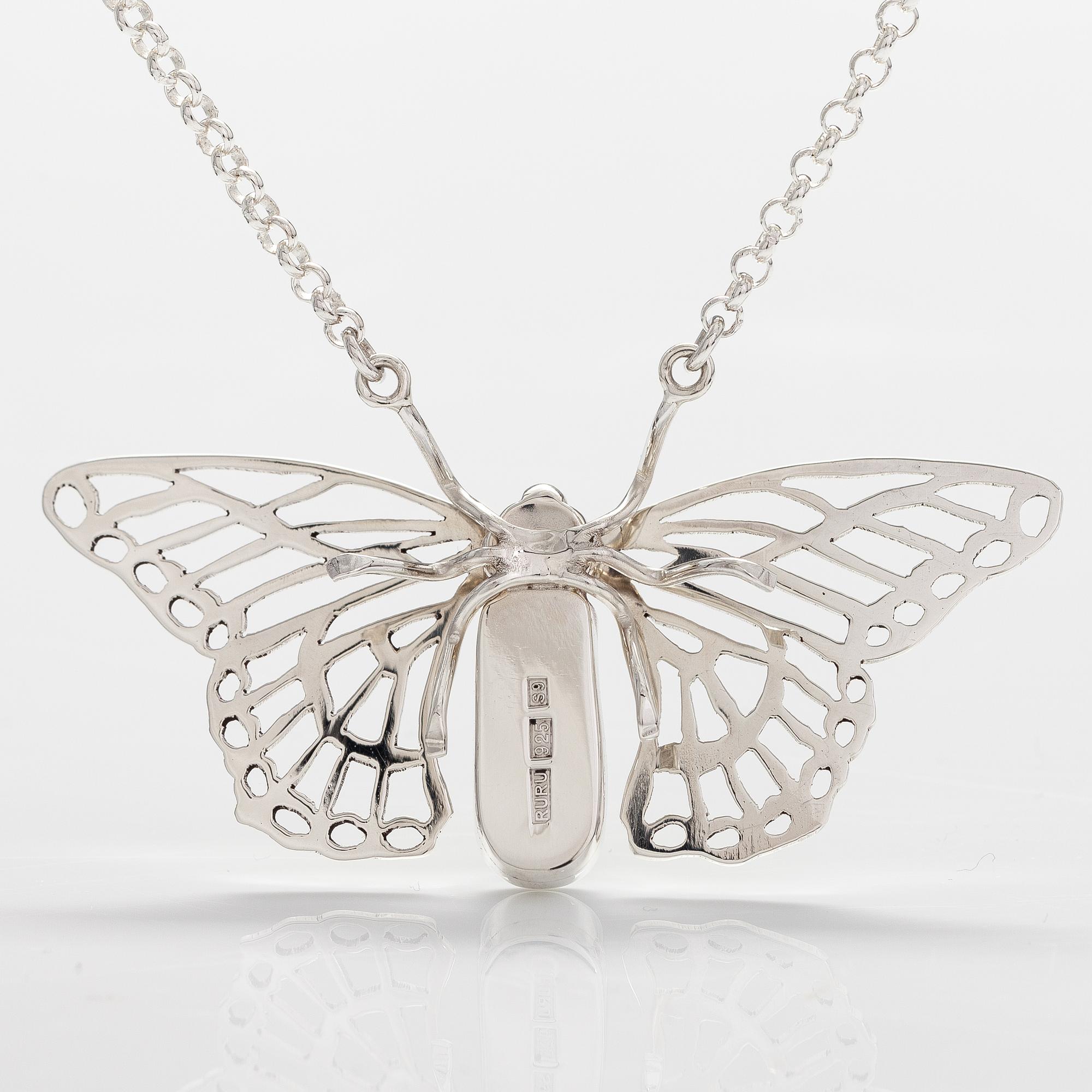 A sterling silver necklace "Butterfly" with dichroic glass. Ru Runeberg 2019.
