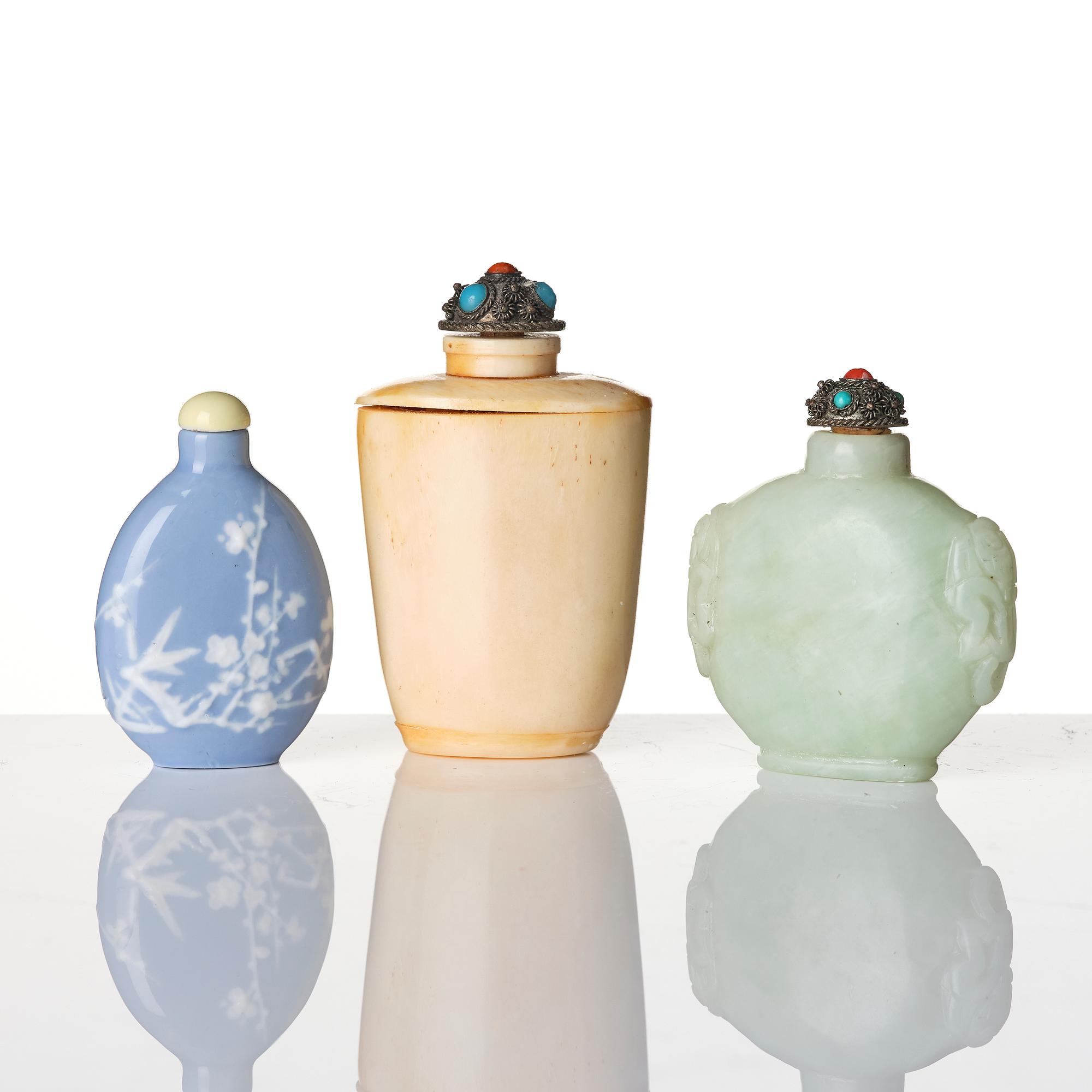 A group of three Chinese snuffbottles, stone, glass and bone, late Qing dynasty / around 1900.