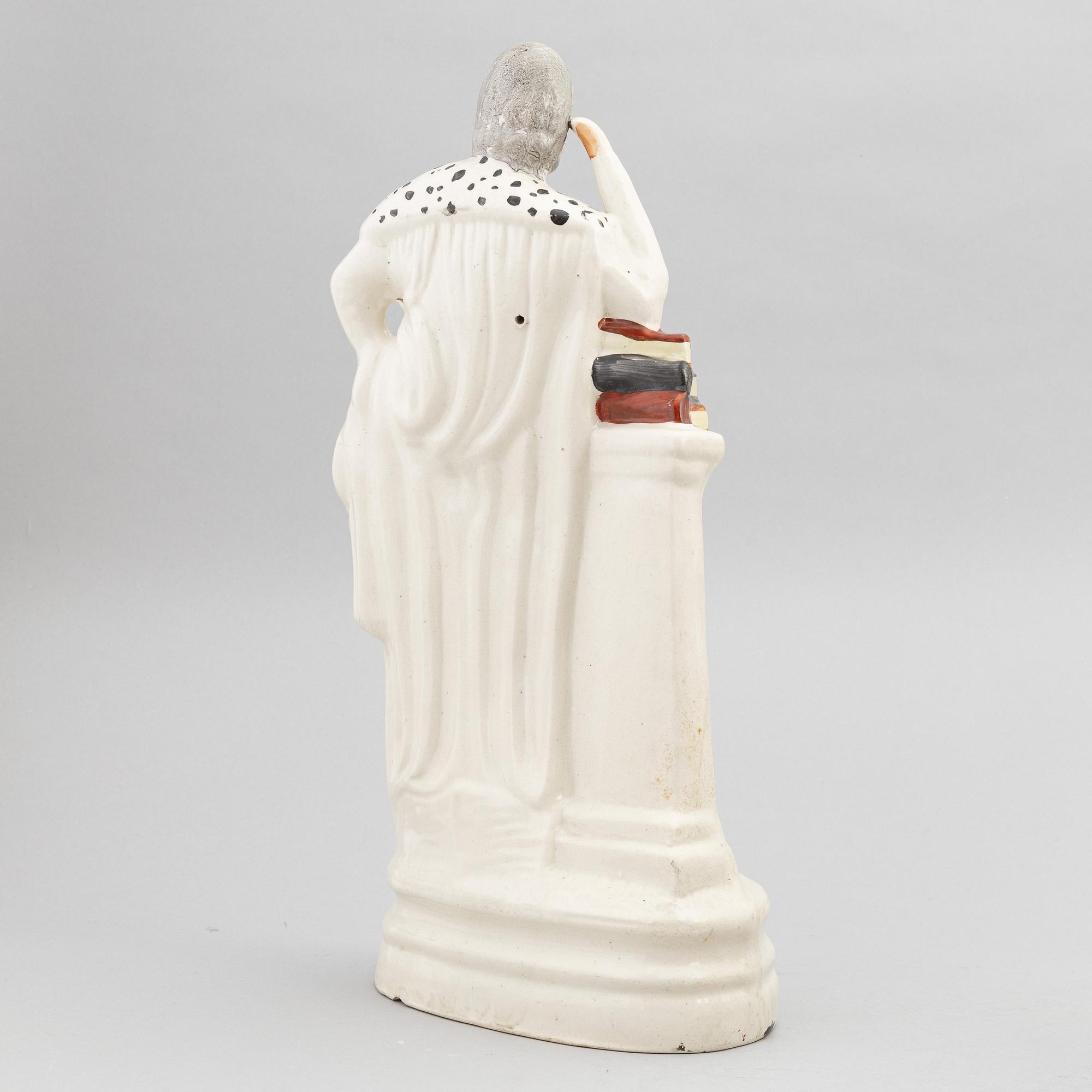 A set of eight English flintware figurines, 20th Century.