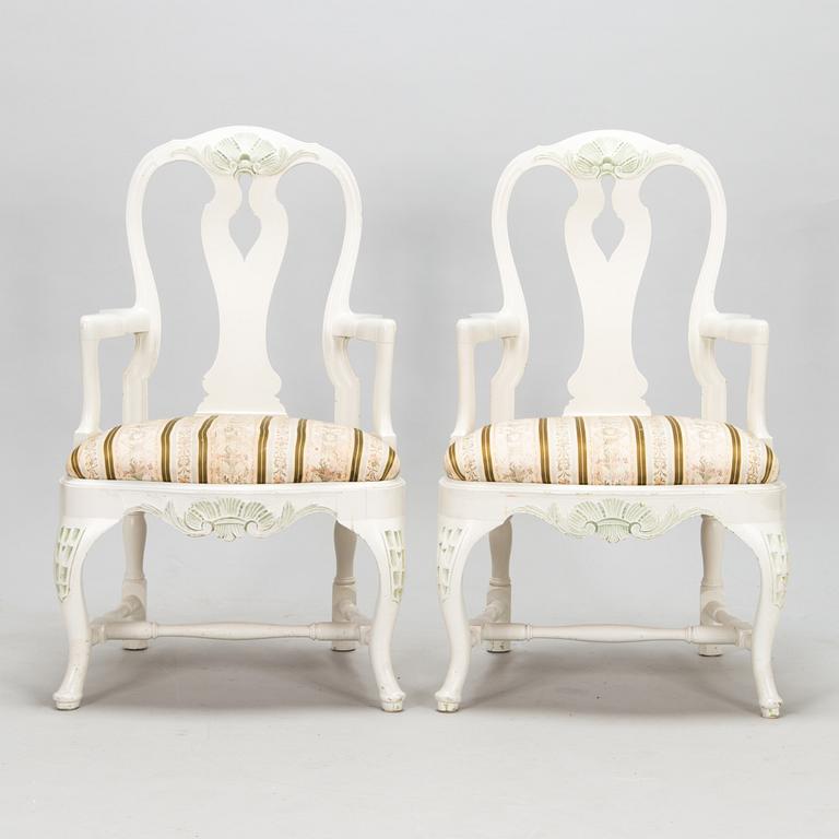 A pair of Rococo style armchairs, a pair of chairs, and a table, mid 20th century.