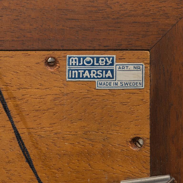 Birger Ekman, väggplakett, Mjöjby Intaria, 1939.