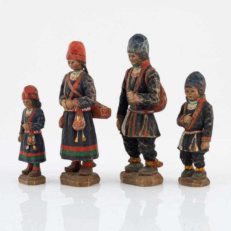 Torborg Lindberg, four carved and painted wooden figures, signed T.L.