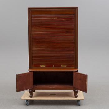 A mahogany veneered cabinet, first half of the 20th Century.