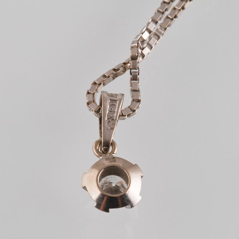 HÄNGE, 18K vitguld med briljantslipad diamant ca 0.23 ct, Bims guldsmide Göteborg. Vikt 4,8 gram.