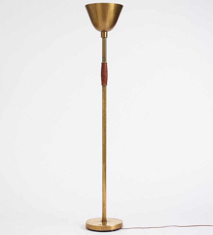 Carl-Axel Acking, a brass and leather floor lamp, designed for the Stockholm Association of Crafts in 1939.