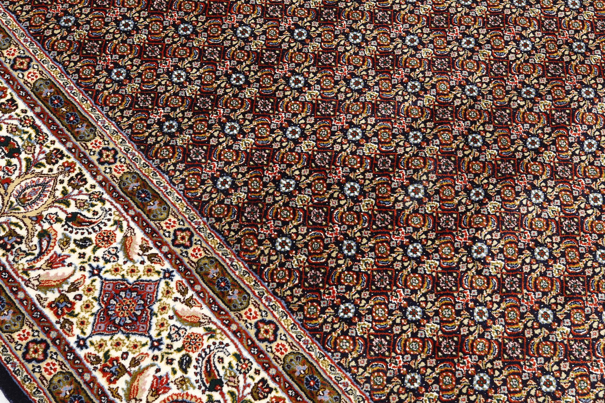 A Moud part silk carpet, signed, 335 x 250 cm.