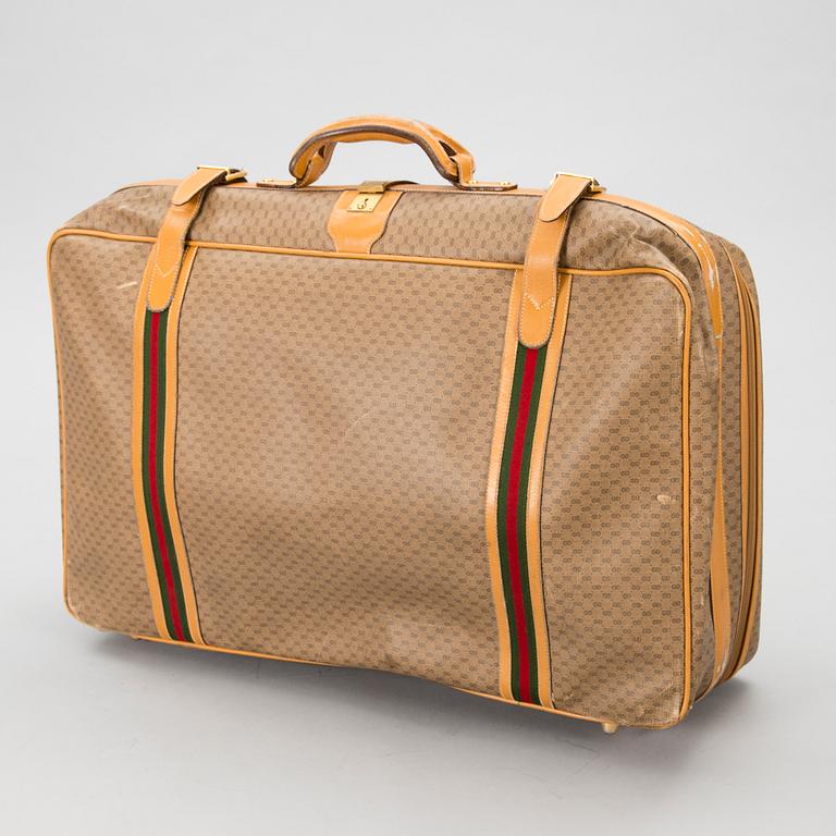 A Large Vintage Micro GG canvas Soft Suitcase.