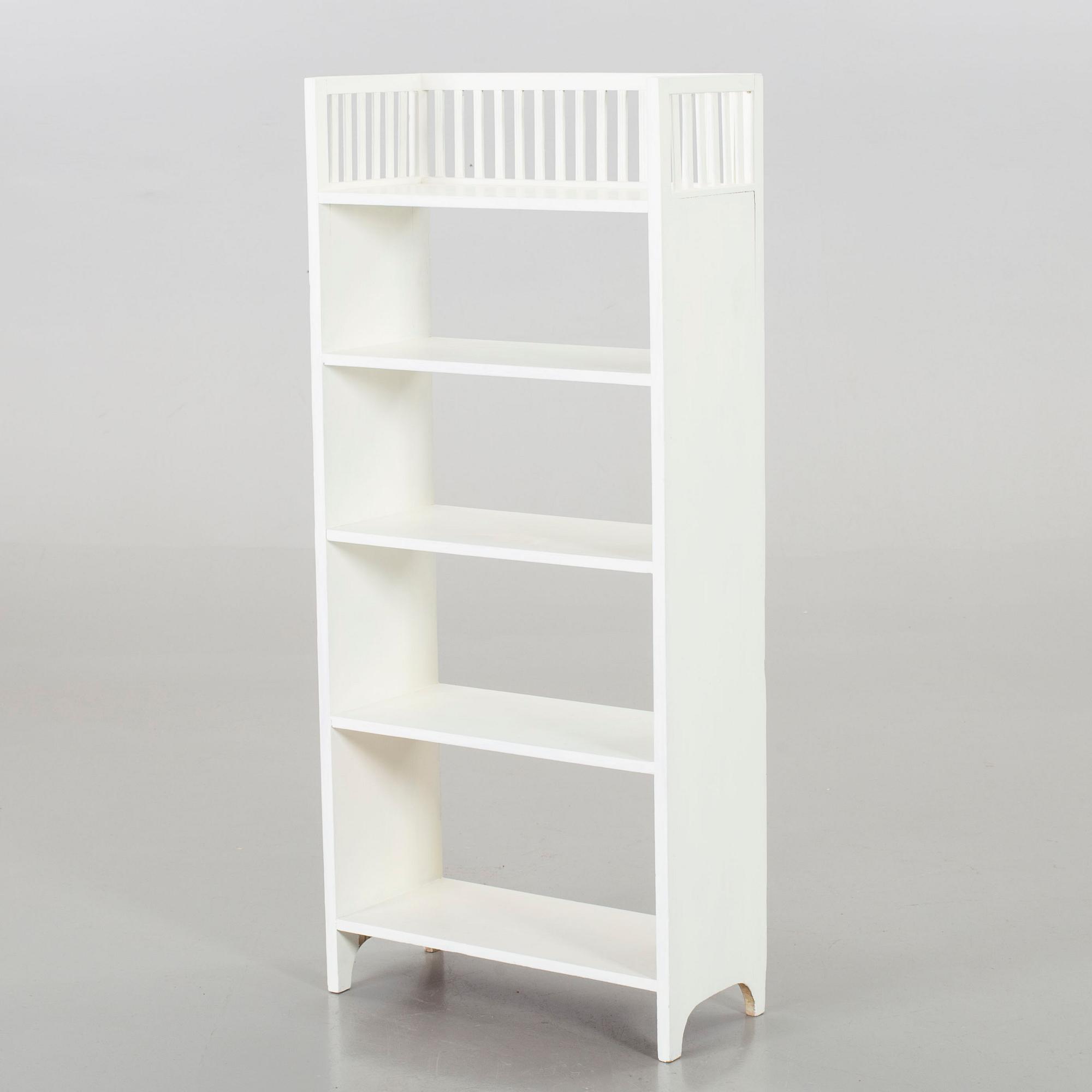 AN ART NOUVEAU BOOKSHELF.
