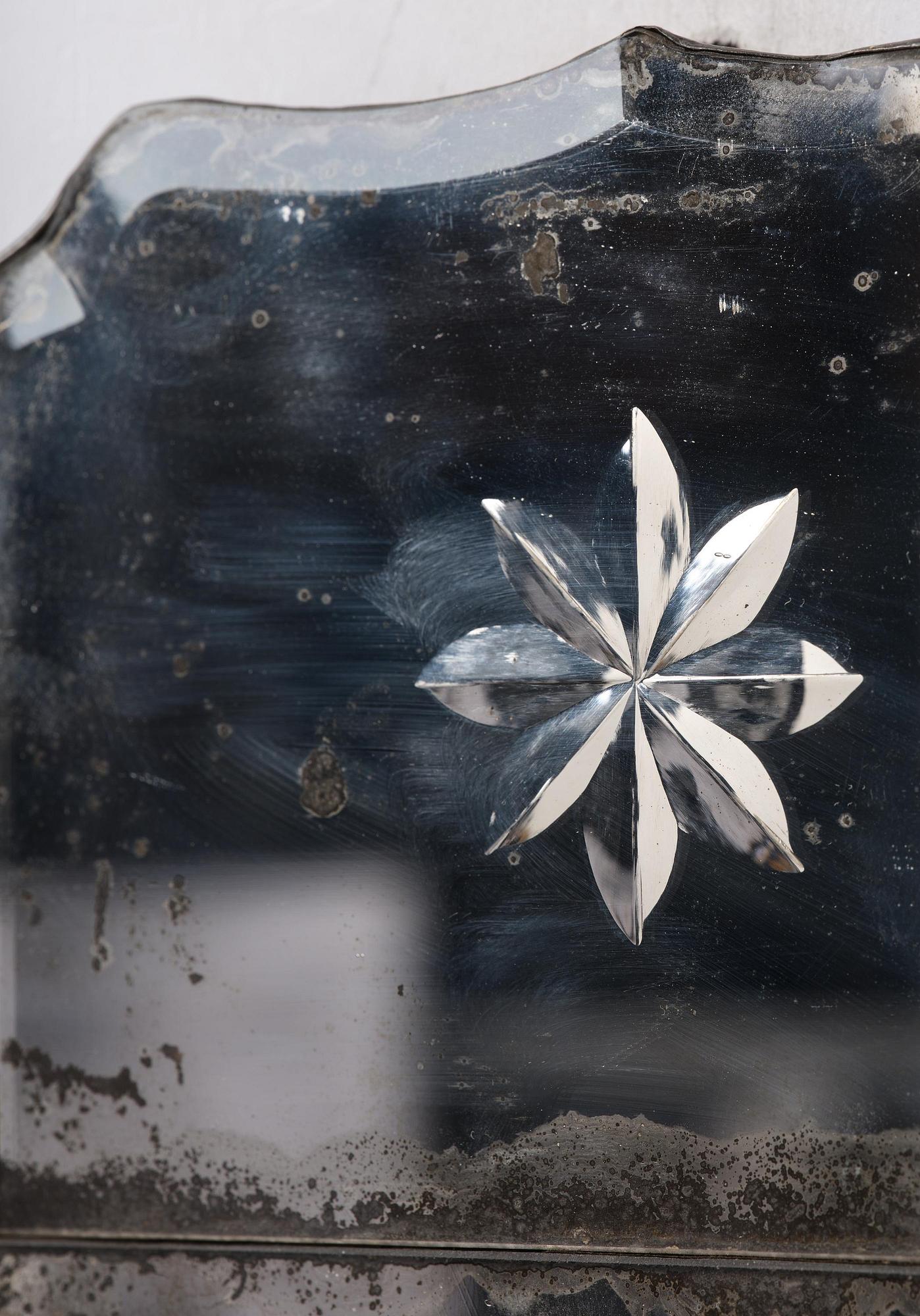 A pair of Gustavian engraved glass one-branch girandole mirrors by N. Meunier (master in Stockholm 1754-97).