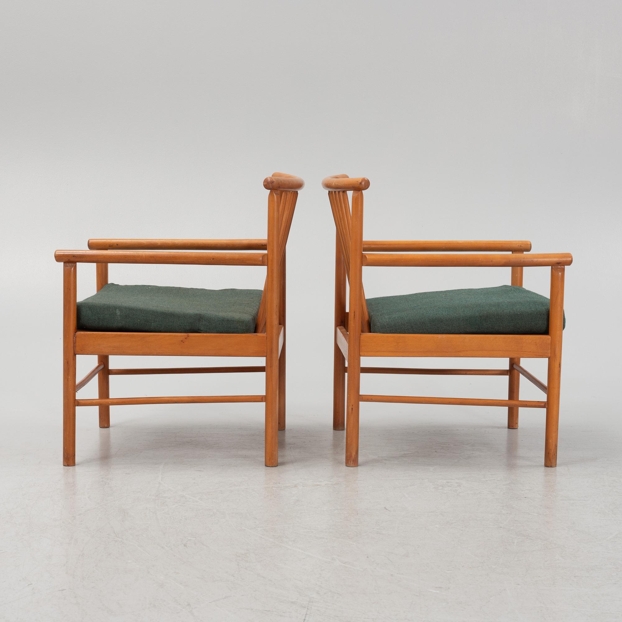 A pair of armchairs, mid 20th Century.