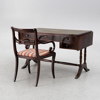 A mahogany veneer desk with desk chair, 20th Century.