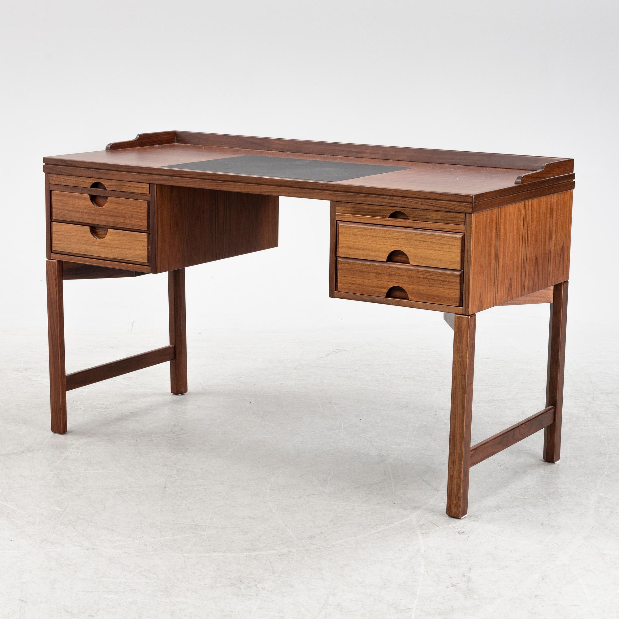 Torbjørn Afdal, a 'Minerva' rosewood desk and a chair, Bruksbo, Haug Snekkeri AS, Norway, 1960's.