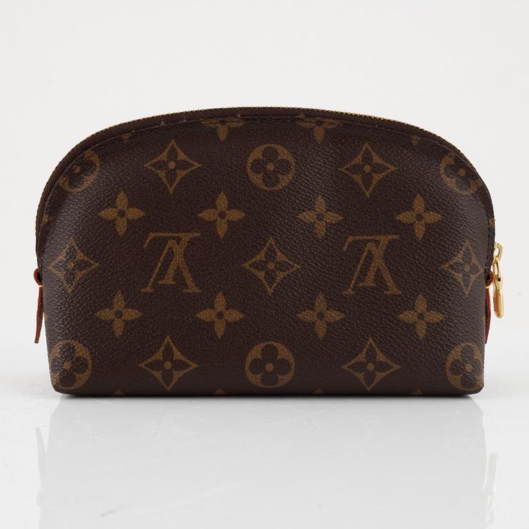 Louis Vuitton, makeup bag and wallet.