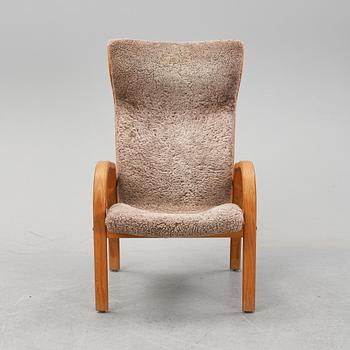 Jan Ekström, a "Gazell" armchair from Conform.