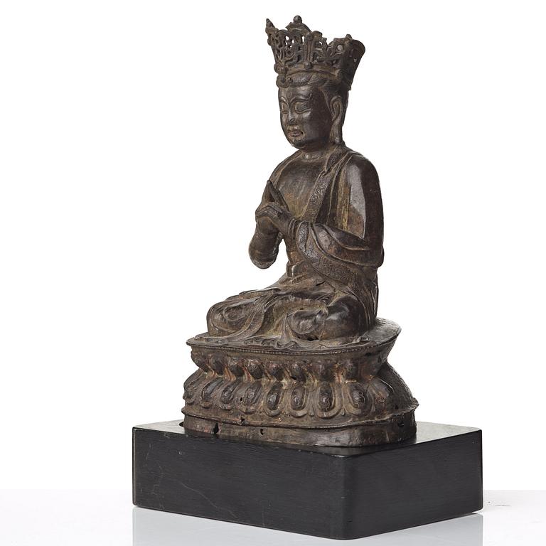 A bronze Vairocana Buddha, late Ming dynasty (1368-1644).