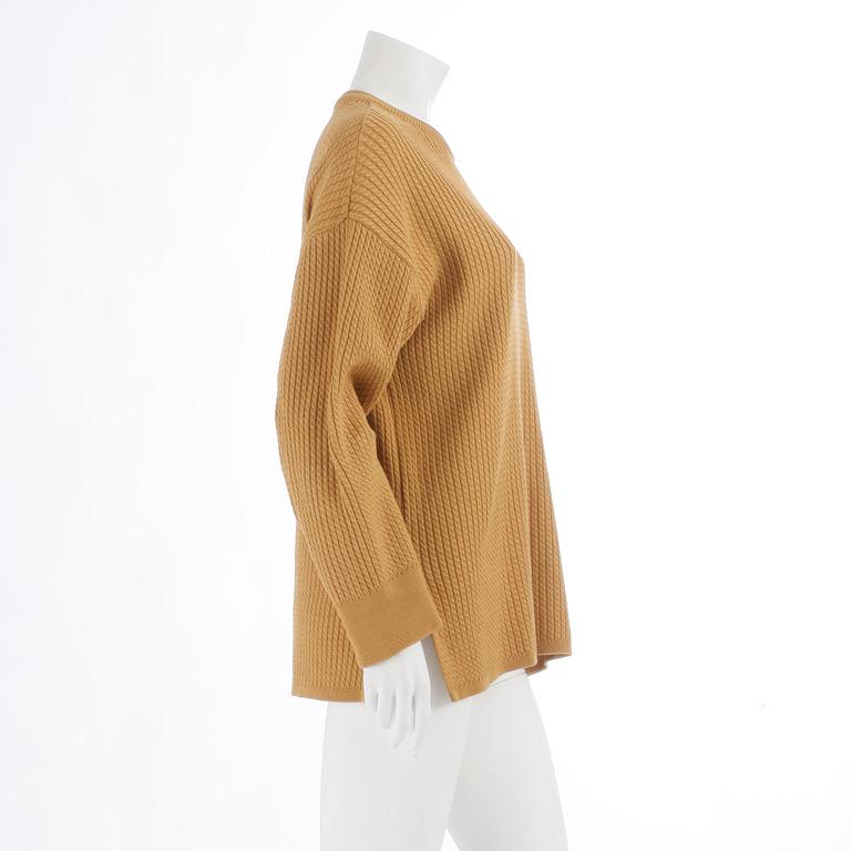 YVES SAINT LAURENT, a yellow mustard sweater, from the 1980s.