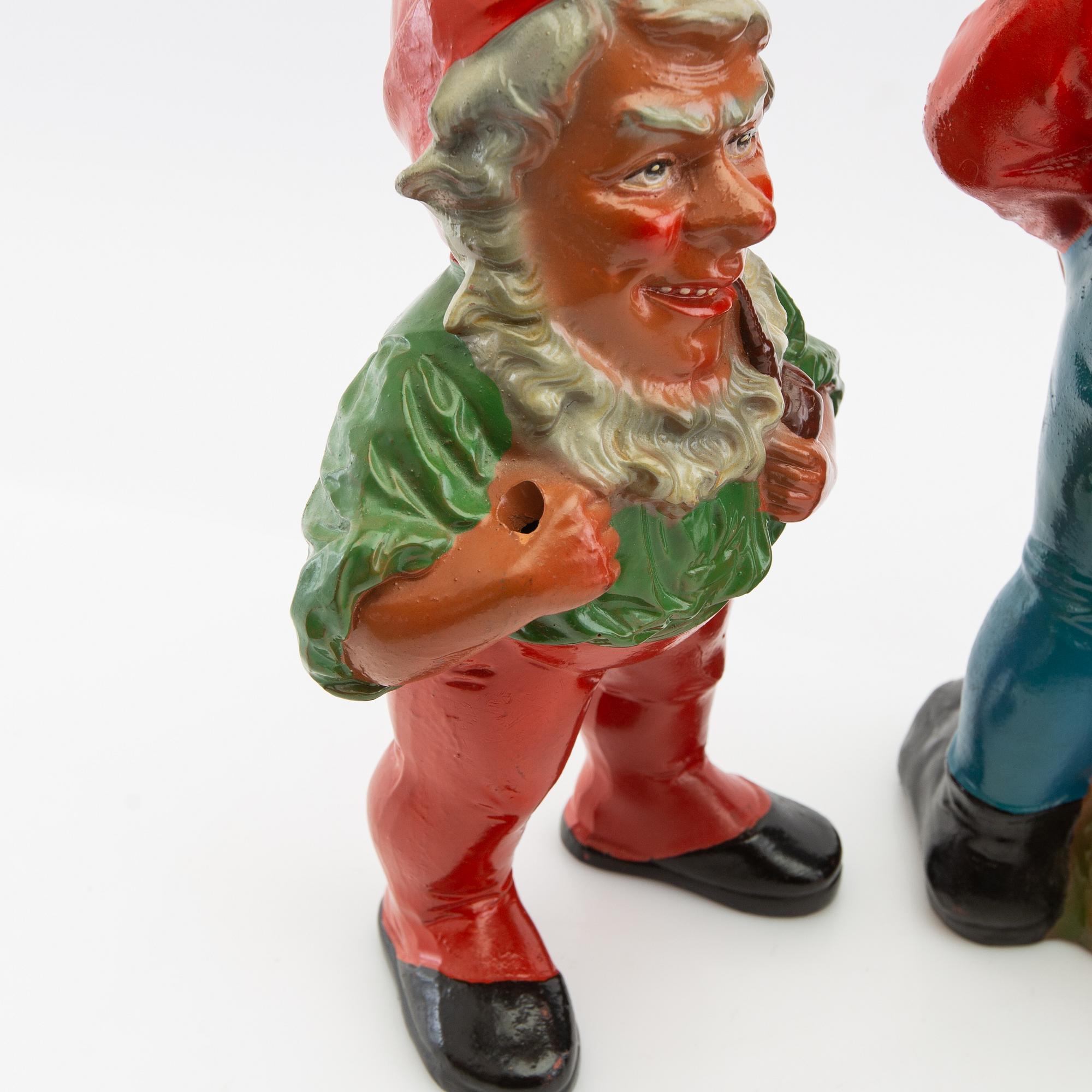 A collection of gnomes 12 pcs mid/late 20th century mostly painted terracotta.