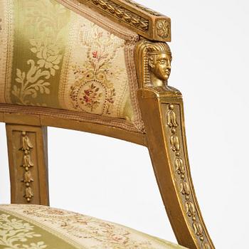 A pair of late Gustavian open armchairs attributed to E. Ståhl (master in Stockholm 1794-1820).