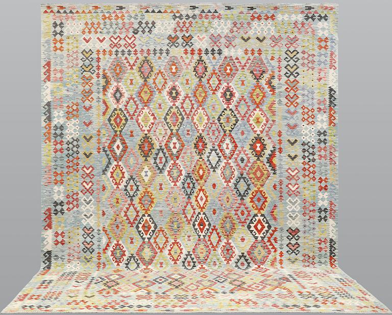 A kilim carpet, c 497 x 359 cm.