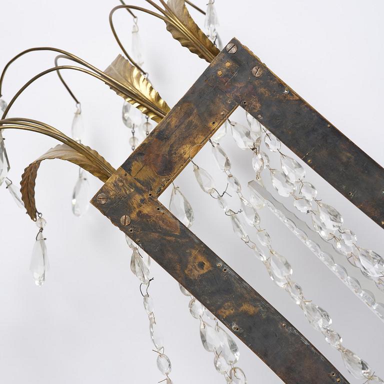 A pair of Russian Louis XVI-style  four-branch gilt bronze appliques, 19th century.