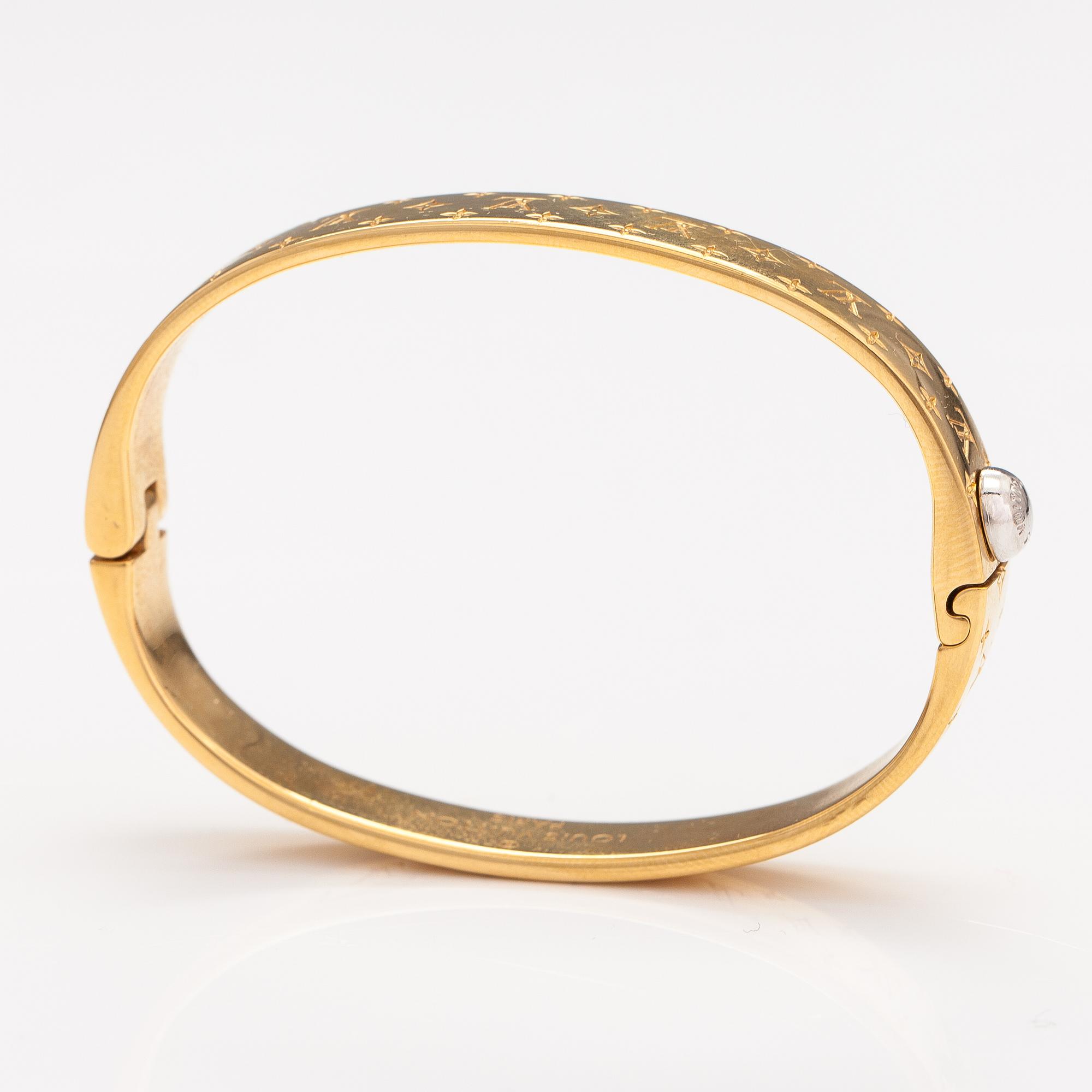 Louis Vuitton Nanogram cuff bracelet. Marked Louis Vuitton Paris Italy. Bukowskis