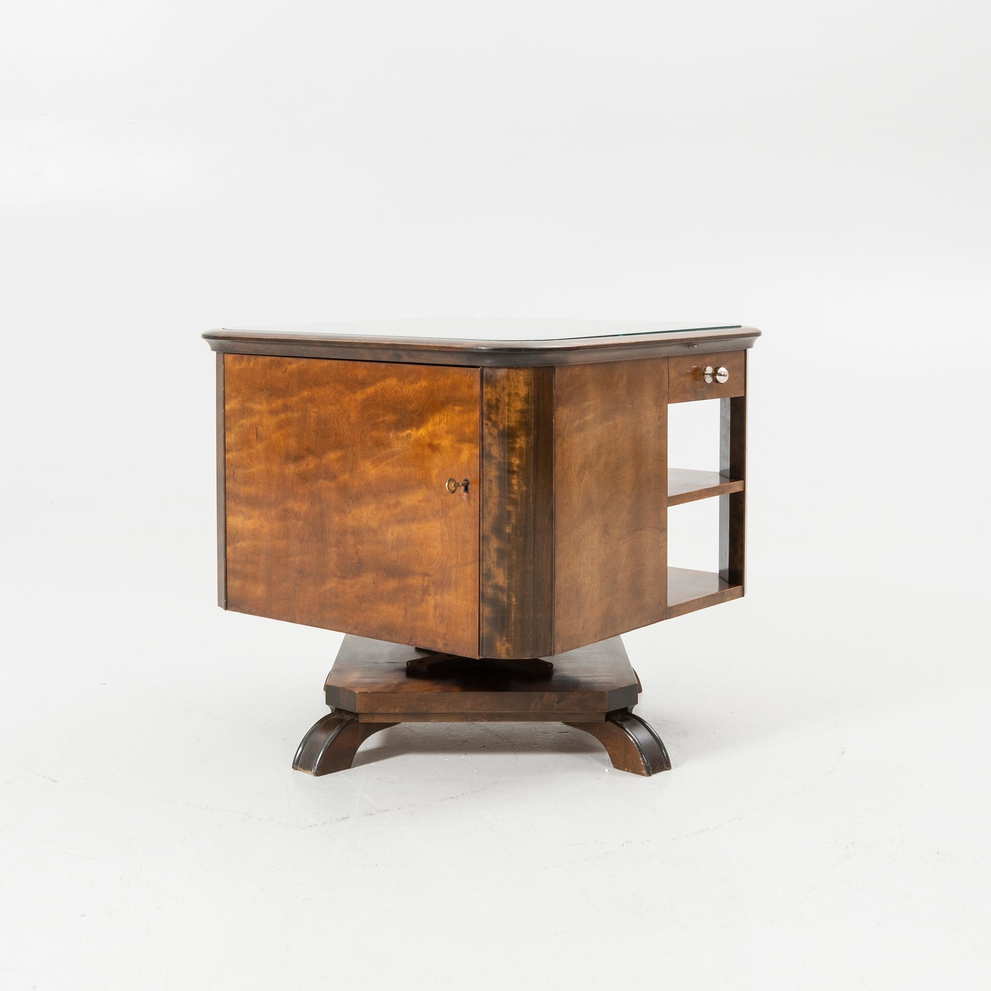 Rotating table with fitted bar, 1930s/40s.