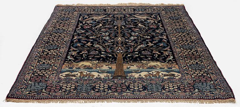 An antique pictoral Tehran rug, North Persia, c. 202 x 138 cm.
