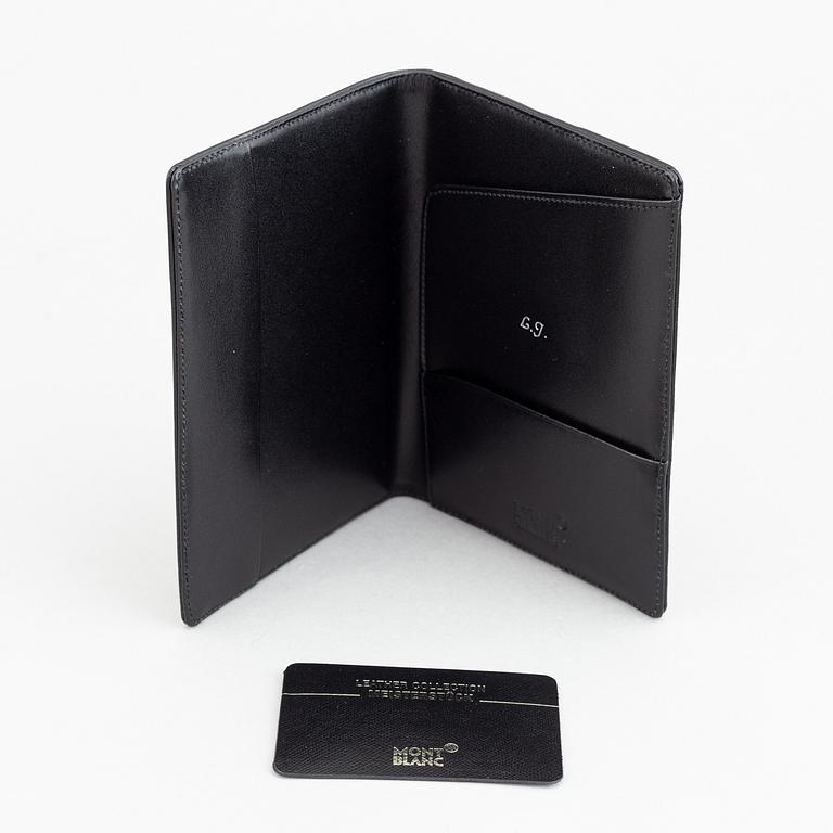MOntblanc, a ball point pen and leather passport holder.