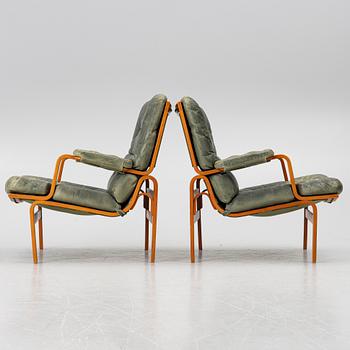 Bruno Mathsson, Armchairs, a pair, "Ingrid", Dux, late 20th century.