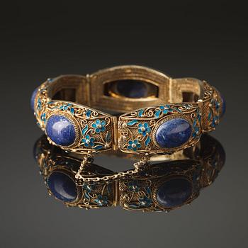 A gilt silver and enamelled Chinese bracelet, early 20th Century.