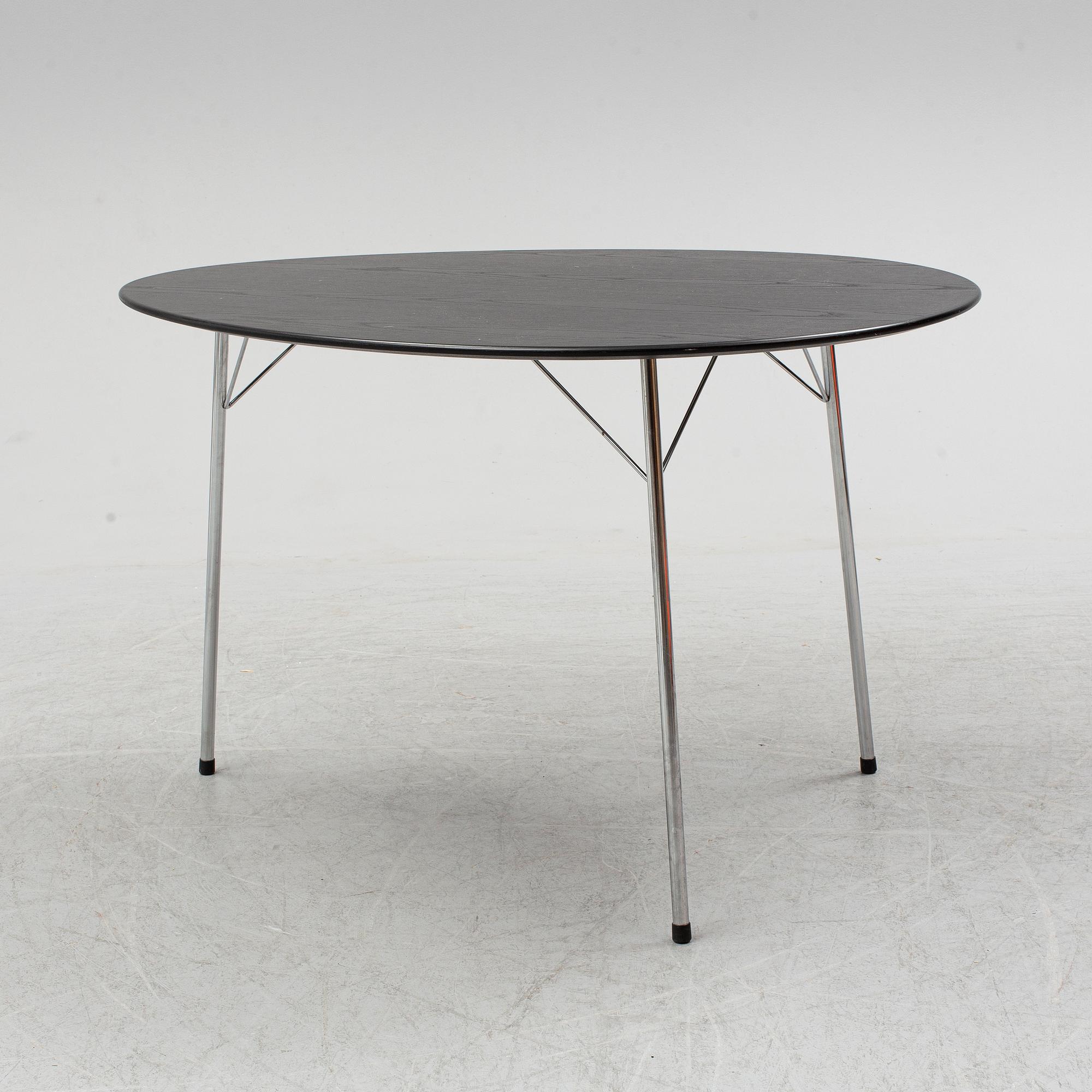 An Arne Jacobsen "Centenary Package" comprising three "Ant Chairs" and an eggshaped table, Fritz Hansen, Denmark.