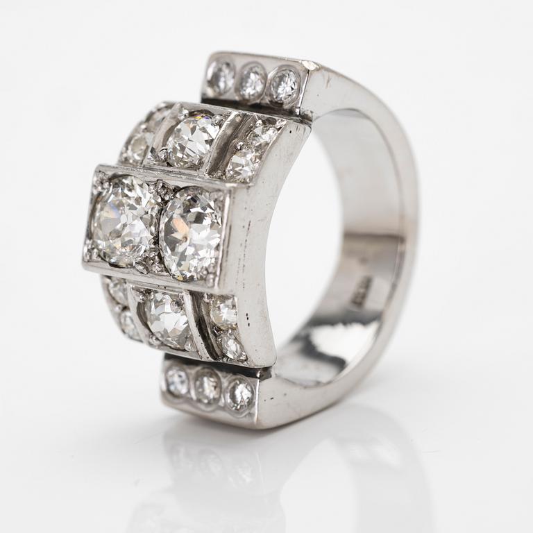 18K white gold ring with diamonds.