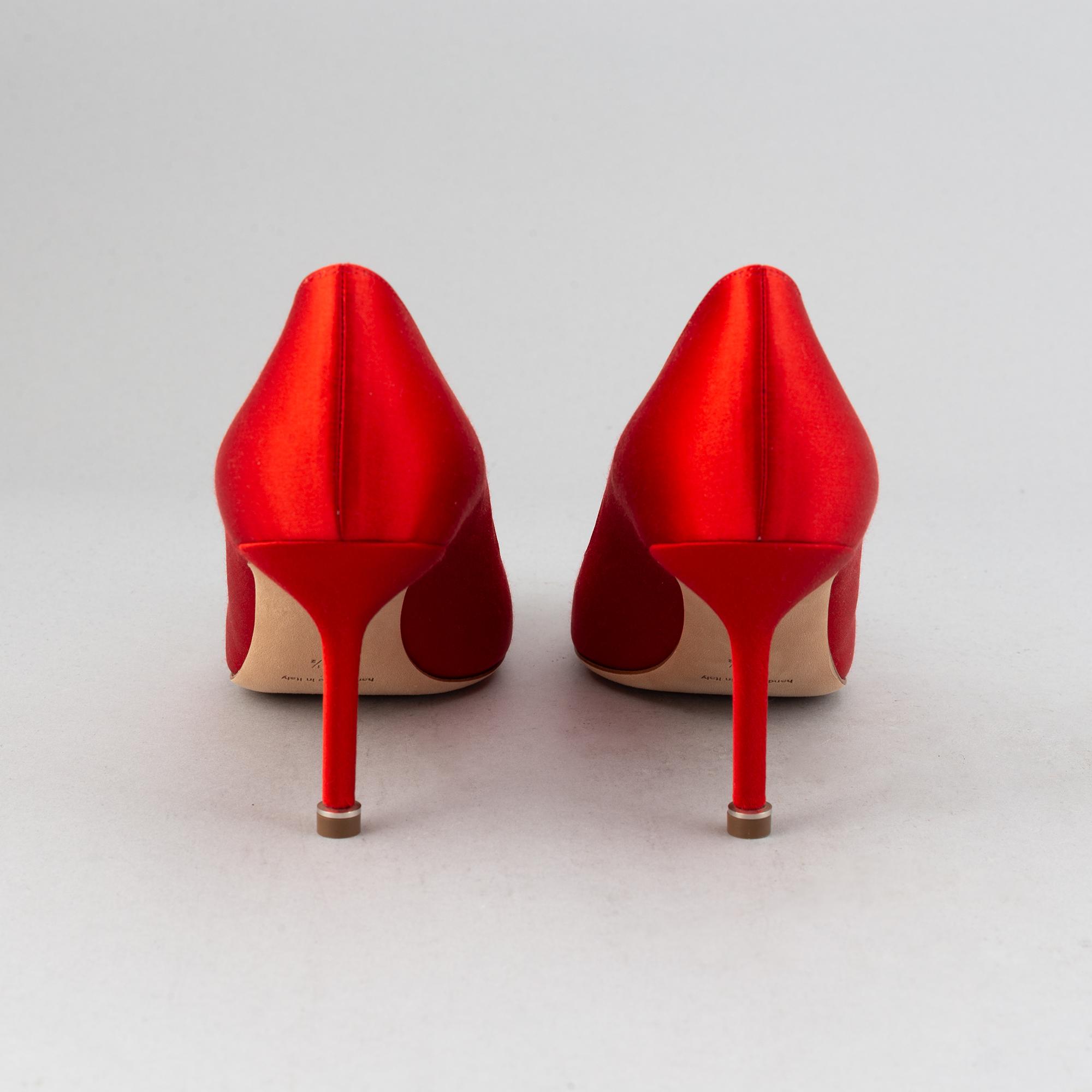 Manolo Blahnik, a pair of red satin 'Hangisi' shoes, 2020, size 38½.