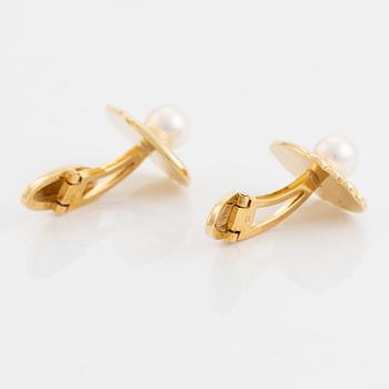Ett par manschettknappar, Mikimoto, 18K guld med odlad pärla.