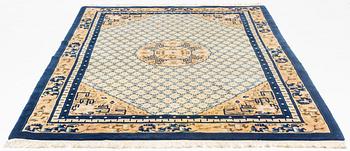 A carpet, China, antique finish, ca 275 x 185 cm.