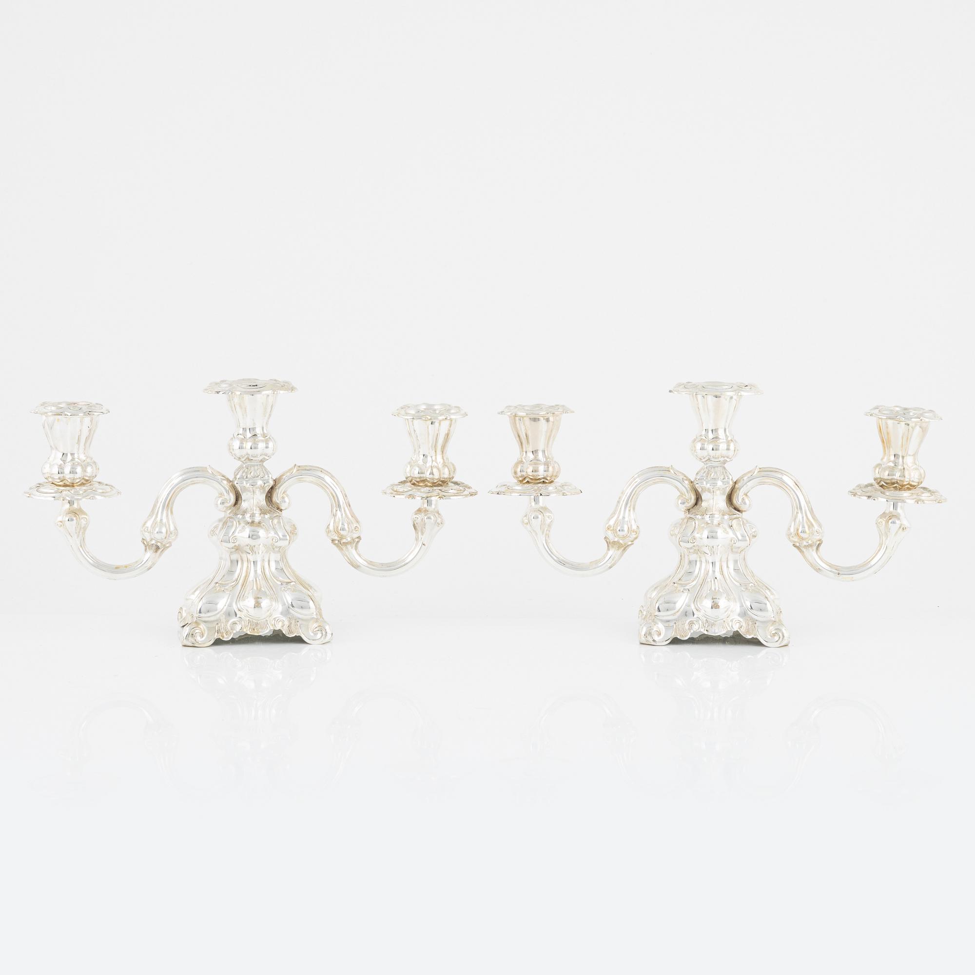 A pair of Baroque style candelabras, early 20th Century.