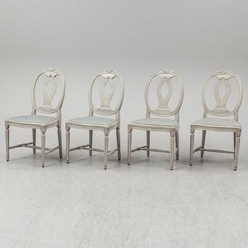A dining table and four chairs, gustavian style, late 20th century.